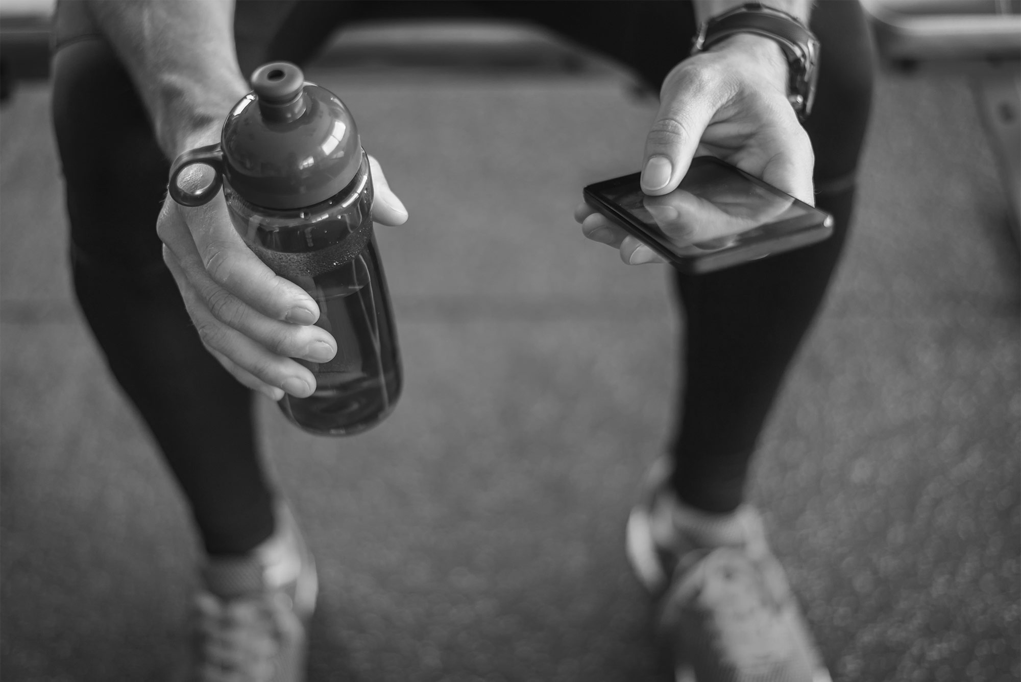 looking at phone bw