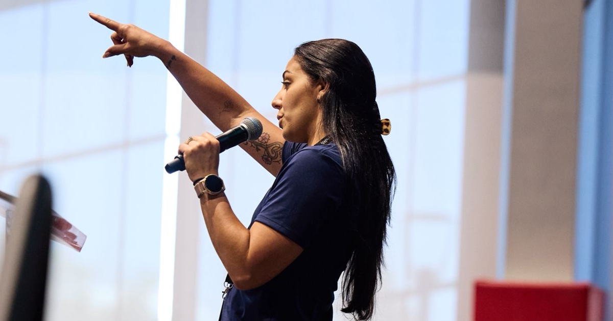 Women speaking in microphone